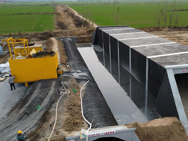 箱涵涵洞两侧流态固化土回填